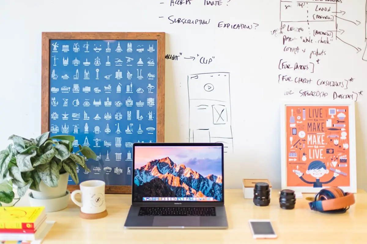  Workspace with laptop and plant
